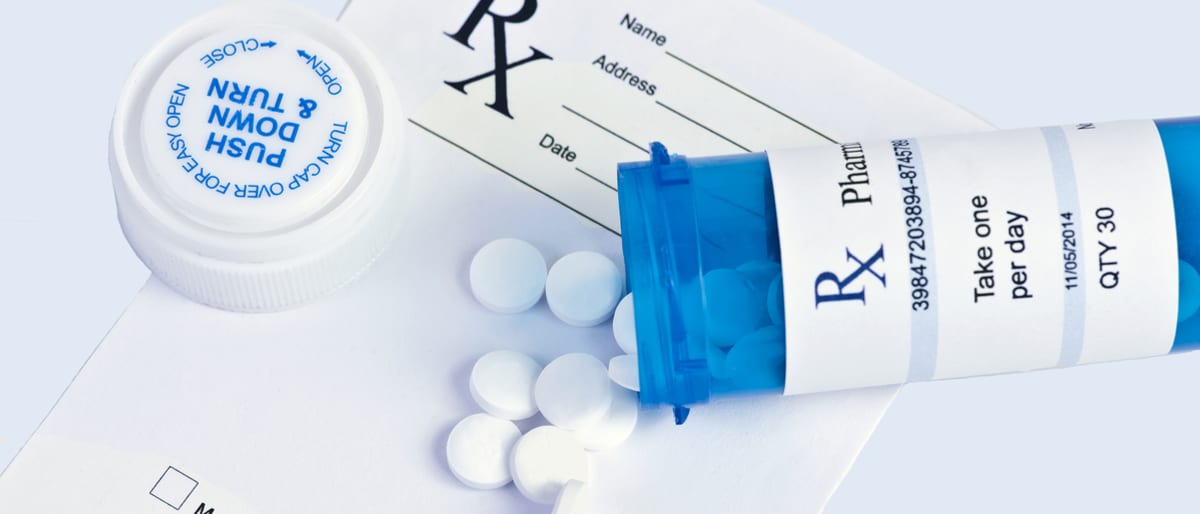Pharmacist reviewing a medication plan with a patient